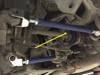 Rear arms after demounting rear spring NISSAN 350Z Z33 - TOE